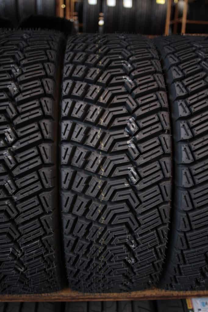 black tyres stored carefully in mot garage